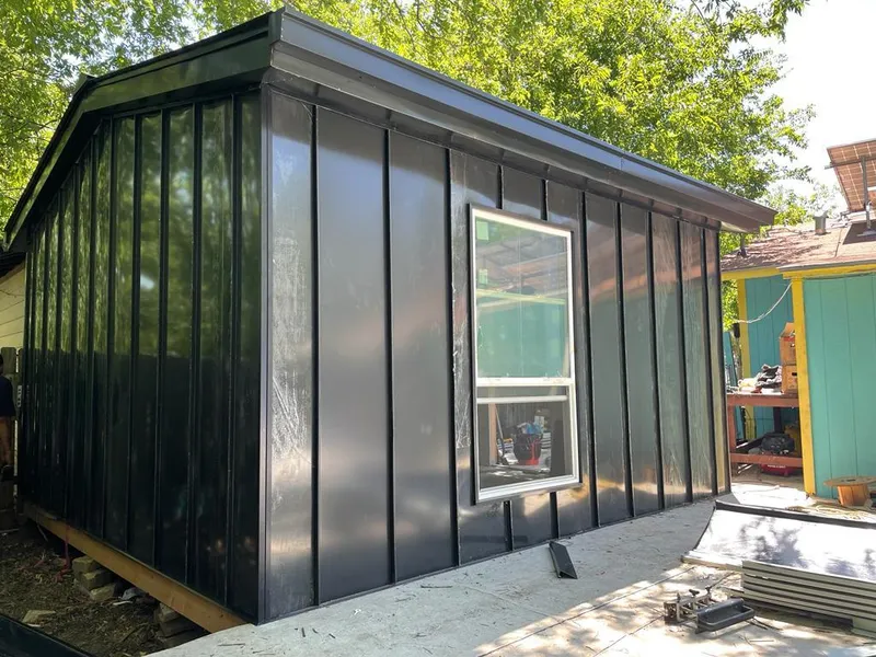 Black standing seam metal wall panels for Roof Inspection in El Centro