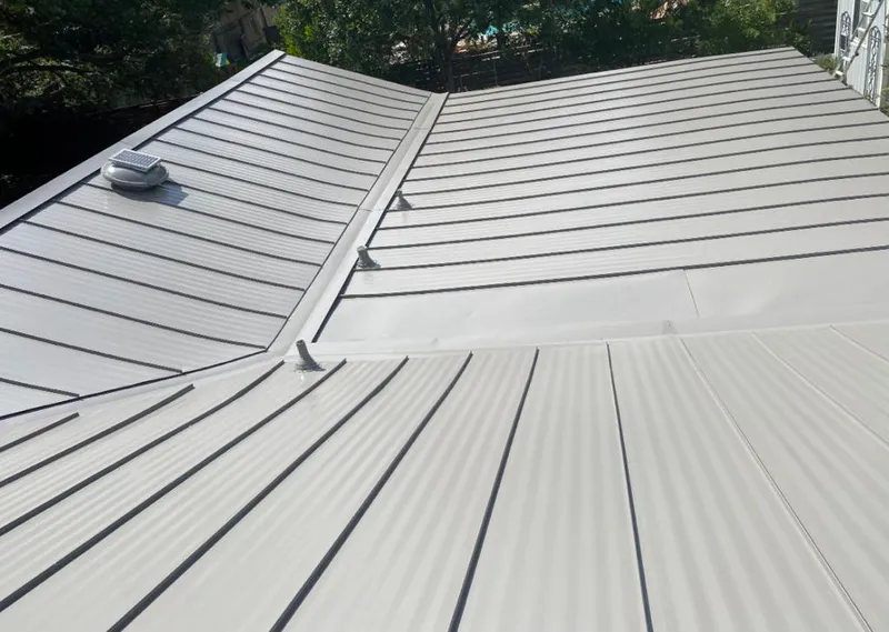 Solar attic fan installed on a metal roof for Roof Ventilation in El Centro